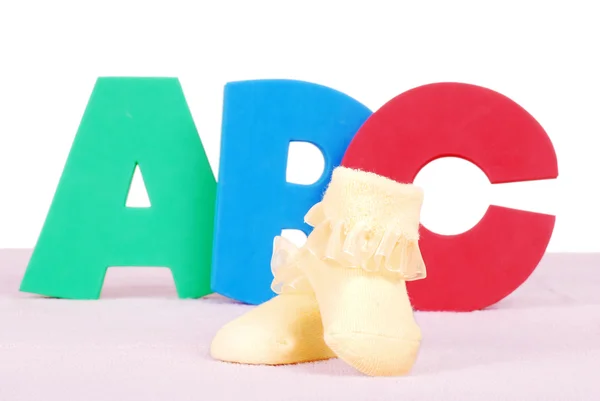 Botas de bebê com letras A B C — Fotografia de Stock