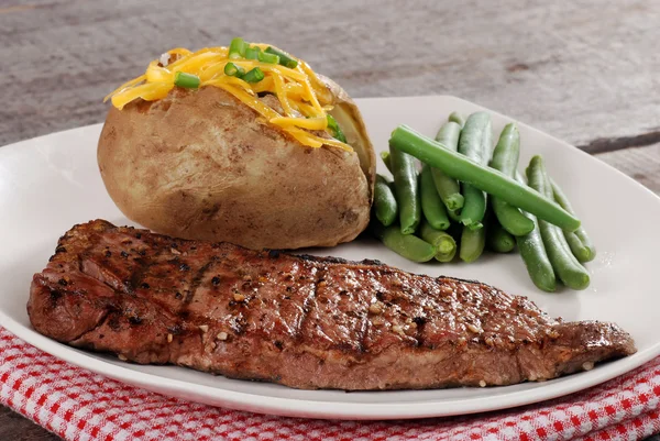 Closeup barbecue steak with vegetables — Stock Photo, Image