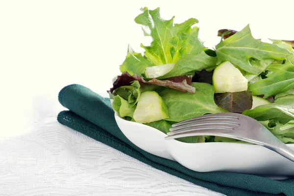 Mixed green salad with cucumber — Stock Photo, Image