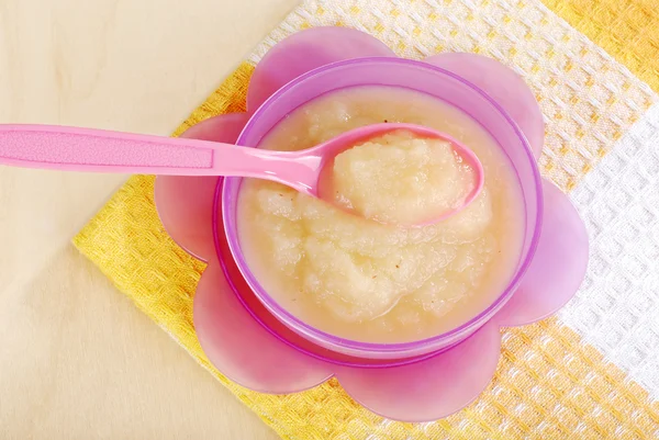 Top view apple sauce in baby bowl — Stock Photo, Image