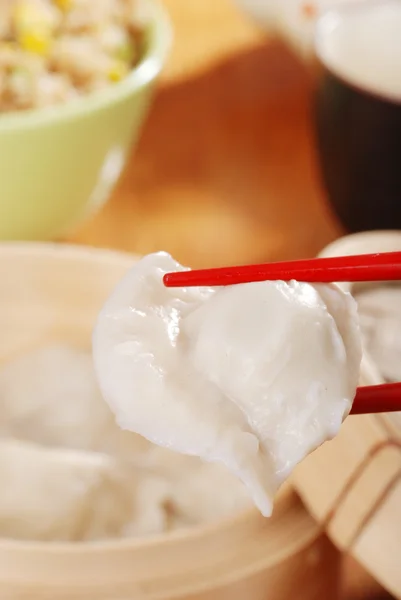 Macro dumpling with chopsticks — Stock Photo, Image