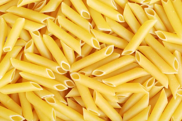 Penne pasta background — Stock Photo, Image