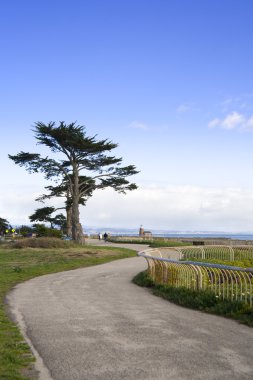 Walkway along the ocean side clipart