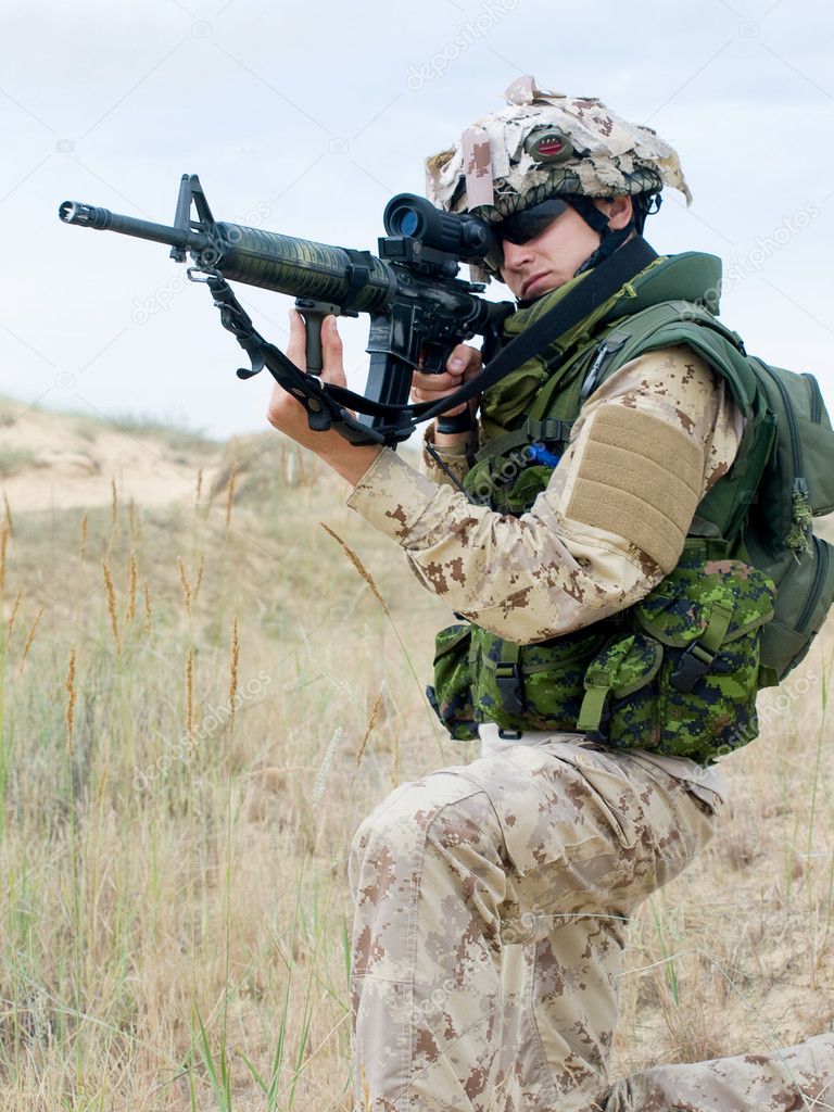 Soldier in desert uniform