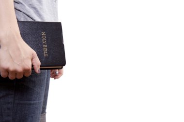 Standing Holding the Bible clipart