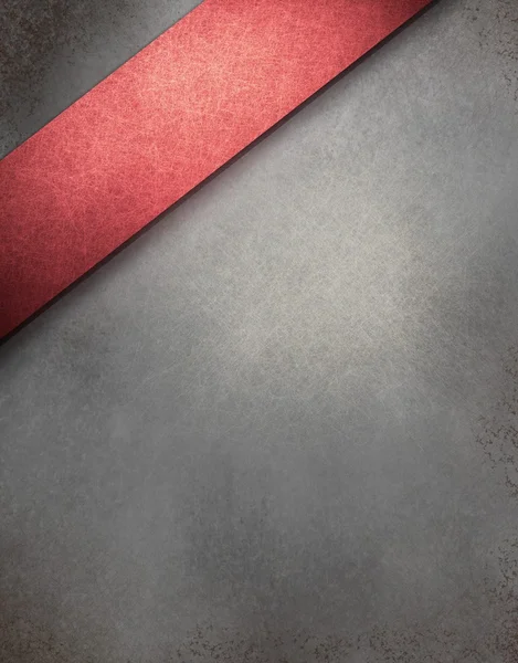Grauer Hintergrund mit roter Schleife — Stockfoto
