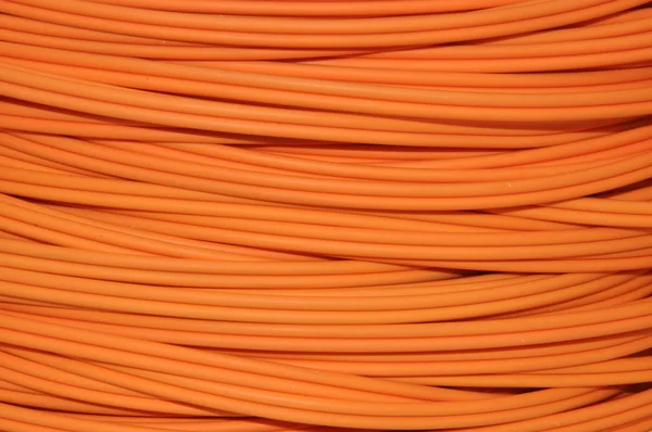 Оранжевый оптический кабель — стоковое фото