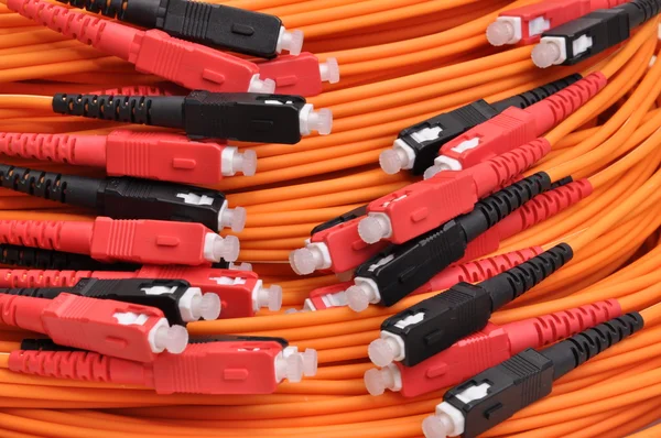 Optische kabels rood en zwart — Stockfoto