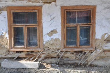 Old window in the ruined building clipart