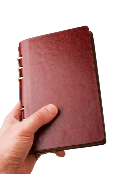 Notebook in hand — Stock Photo, Image