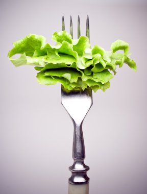 Salad on a fork clipart