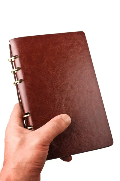 Ruka s notebook — Stock fotografie