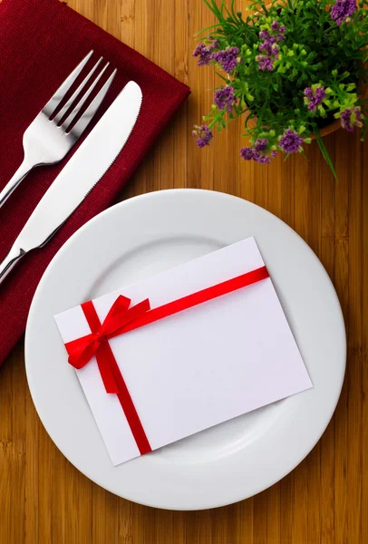 Plate with card — Stock Photo, Image