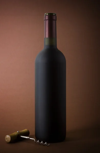 Vývrtka a láhev vína — Stock fotografie