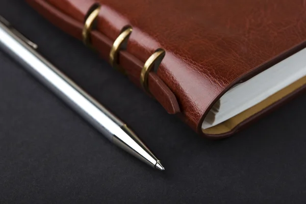 Notepad with pen — Stock Photo, Image