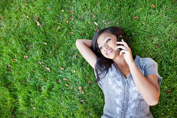 Asian student on the phone — Stock Photo, Image