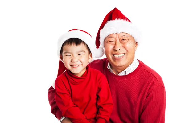 Азиатский дедушка празднует Рождество с внуком — стоковое фото