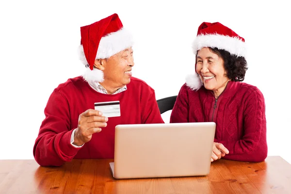Çevrimiçi kutluyor Noel alışveriş kıdemli Asya çift — Stok fotoğraf