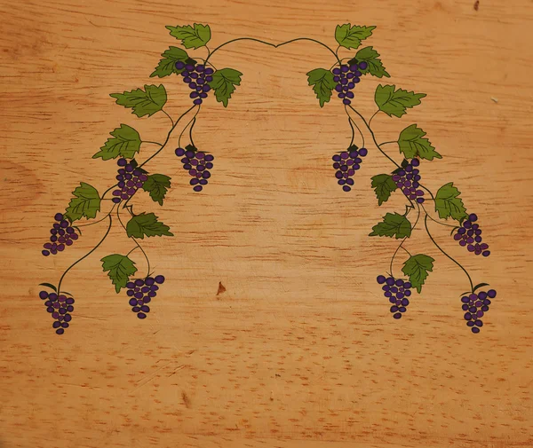 Viña de uva en la textura de madera —  Fotos de Stock
