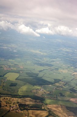 Aerial view of landscape from airplane clipart