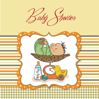 Baby boy weighed on the scale clipart