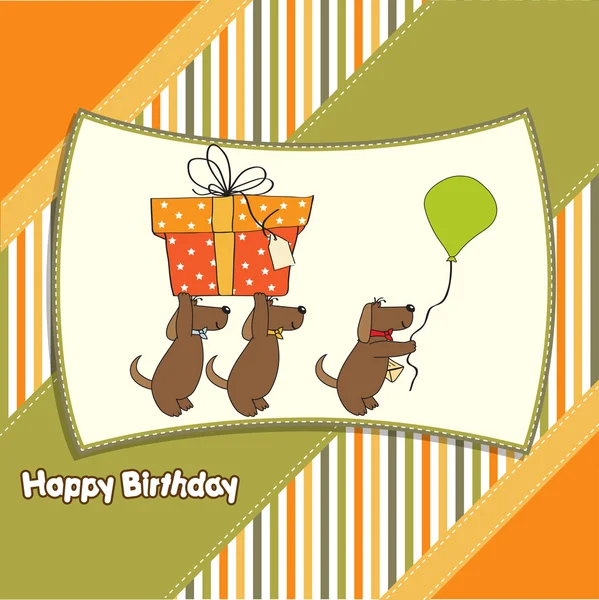 Drie honden die een groot geschenk aanbieden. verjaardagskaart — Stockfoto