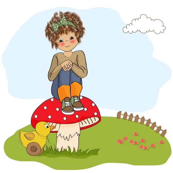 Kudrnatá dívka hra s její hračka kachna — Stock fotografie