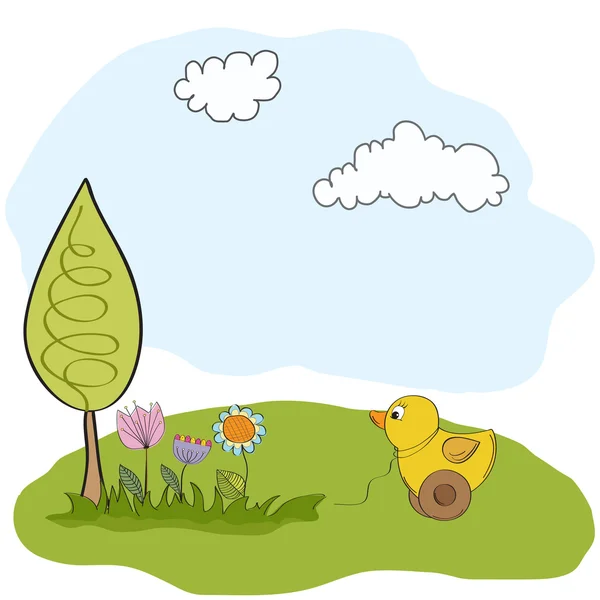 Cartão de saudação primavera com brinquedo de pato — Fotografia de Stock