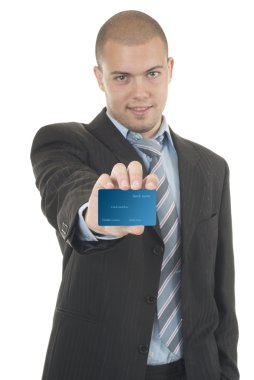 Businessman in suit holding credit card clipart