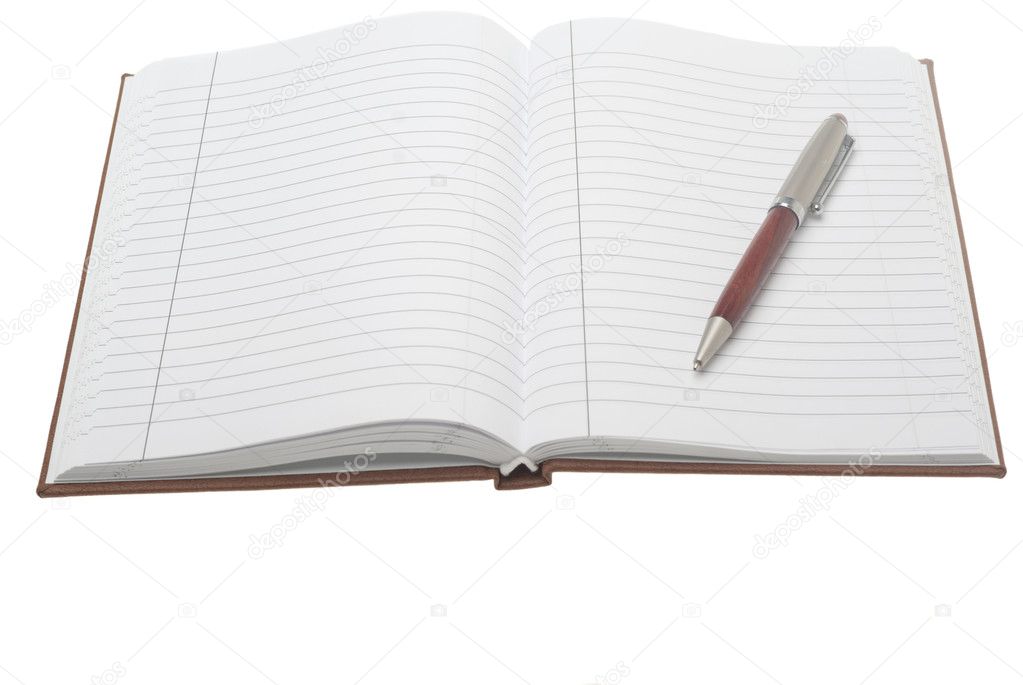 Notebook with pen on it