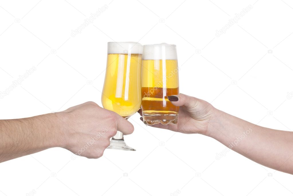 Man and woman toasting with beer
