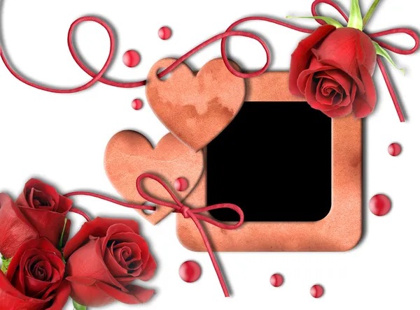 Вінтажна фоторамка, червоні троянди та серце — стокове фото
