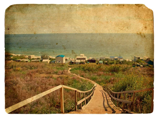 一个楼梯通往海边。老明信片. — 图库照片