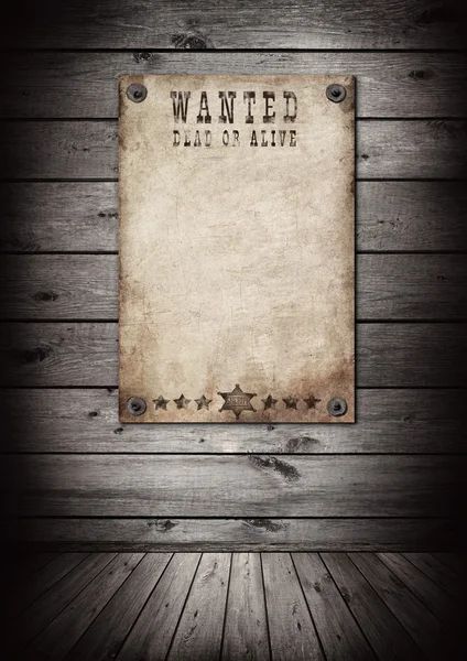 Wanted poster in old grunge interior. — Stock Photo, Image