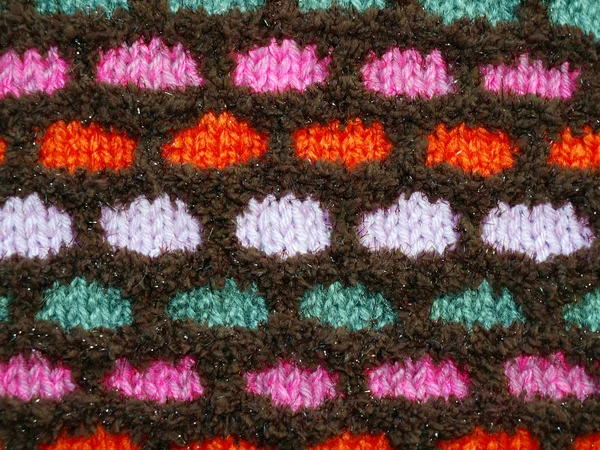 Multi-gekleurde zachte gebreide stof met een patroon. — Stockfoto