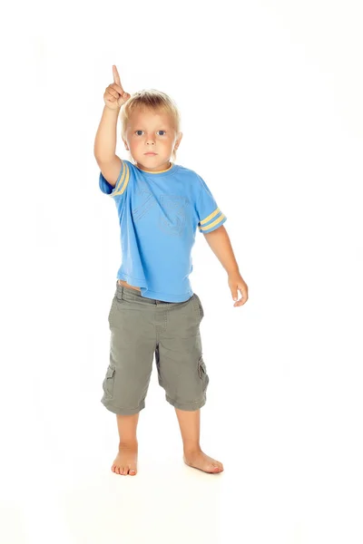 Söta unge pekar uppåt, isolerade på vit bakgrund — Stockfoto