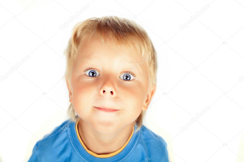 Funny kid with the big eyes close up. isolated on white backgrou