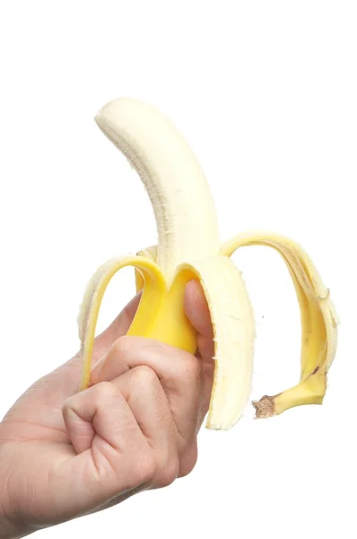Ręka trzymać banana — Zdjęcie stockowe