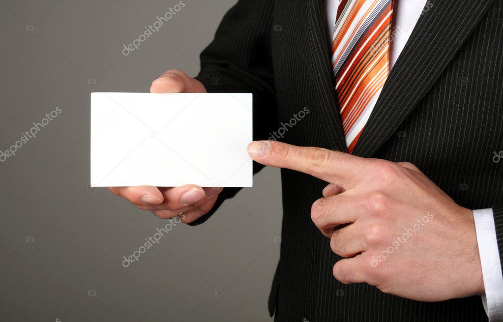 Business man offering card