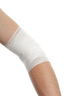 Medical bandage on injury elbow clipart