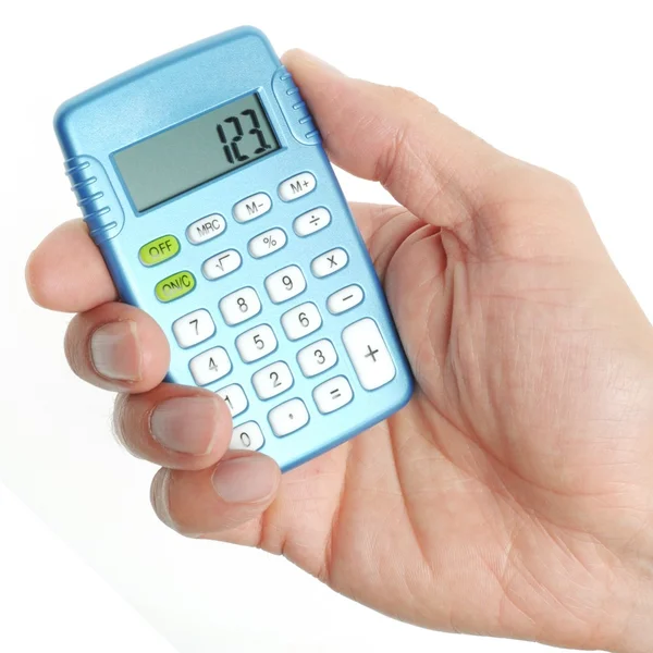 Main tenant une calculatrice — Photo
