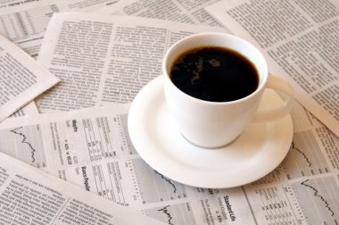 Coffee over newspaper clipart