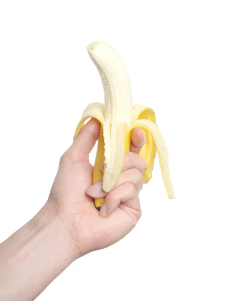 Mão segura uma banana — Fotografia de Stock
