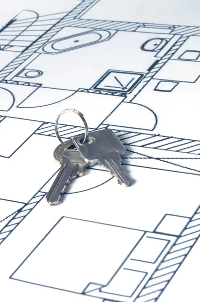 House key on a blueprint — Stockfoto