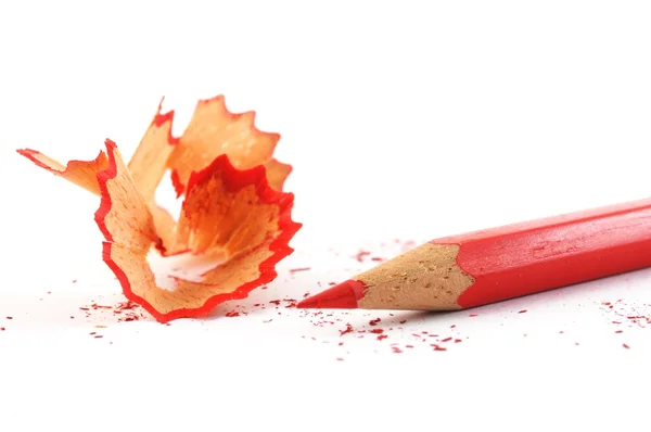 Red crayon wiht shavings — Stock Photo, Image