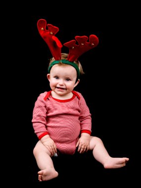 Baby girl in christmas costume clipart