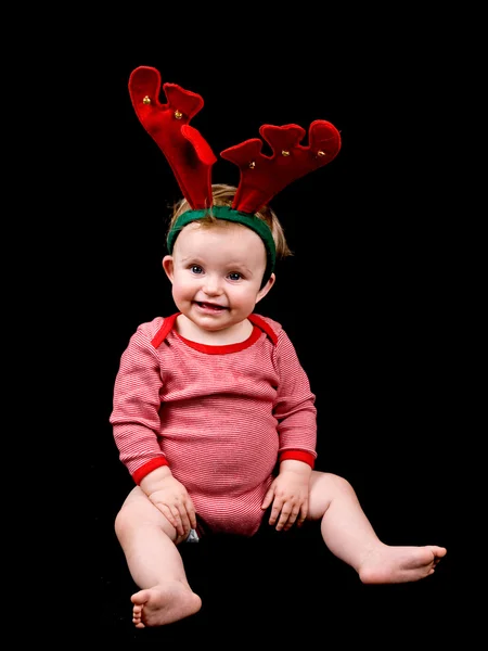 Meisje van de baby in kerstfeest kostuum Stockafbeelding