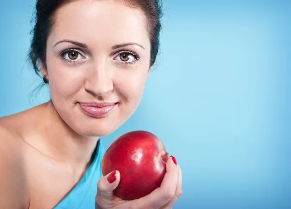 Girl and apple Stock Image