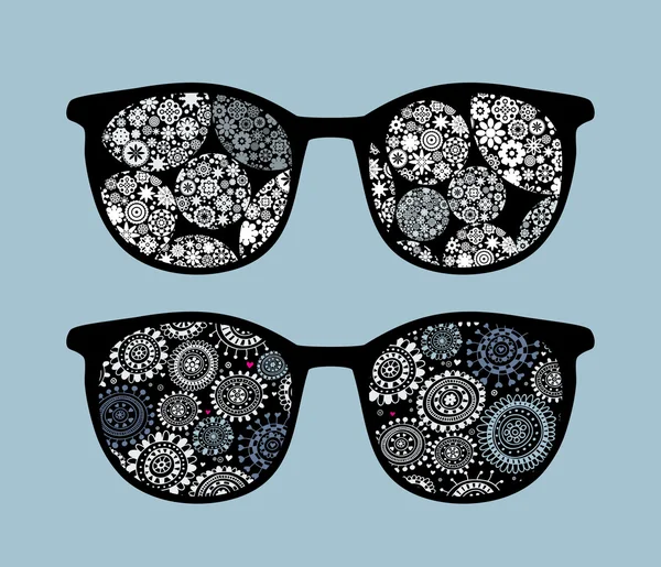 Retro eyeglasses with snowflakes reflection in it. — Stock Vector
