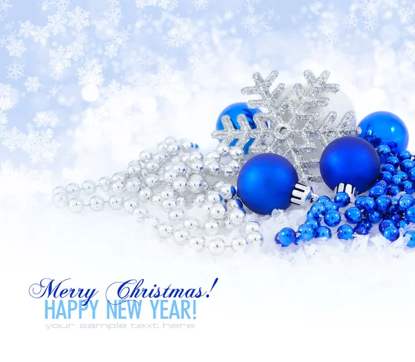 Blue and silver christmas decoration baubles on white with space — Stock Photo, Image